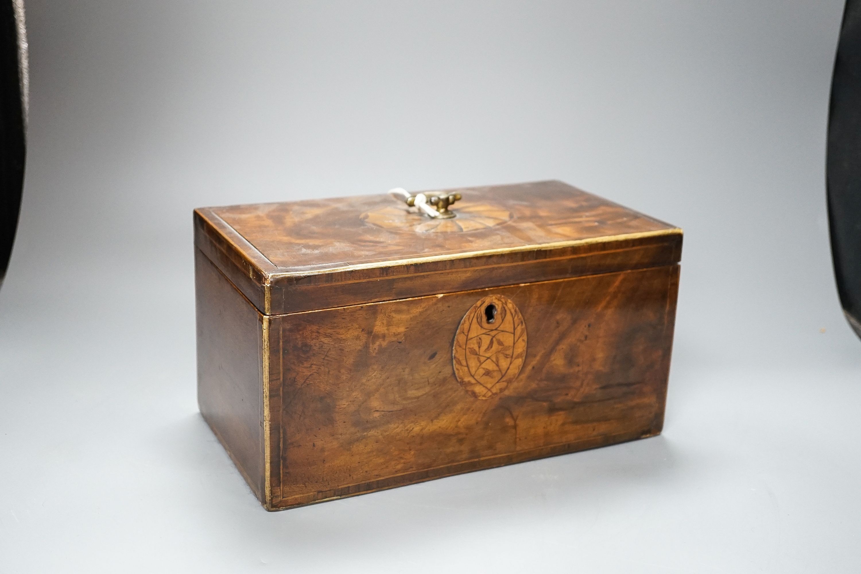 A George III inlaid mahogany tea caddy, lacking interior, 28cm